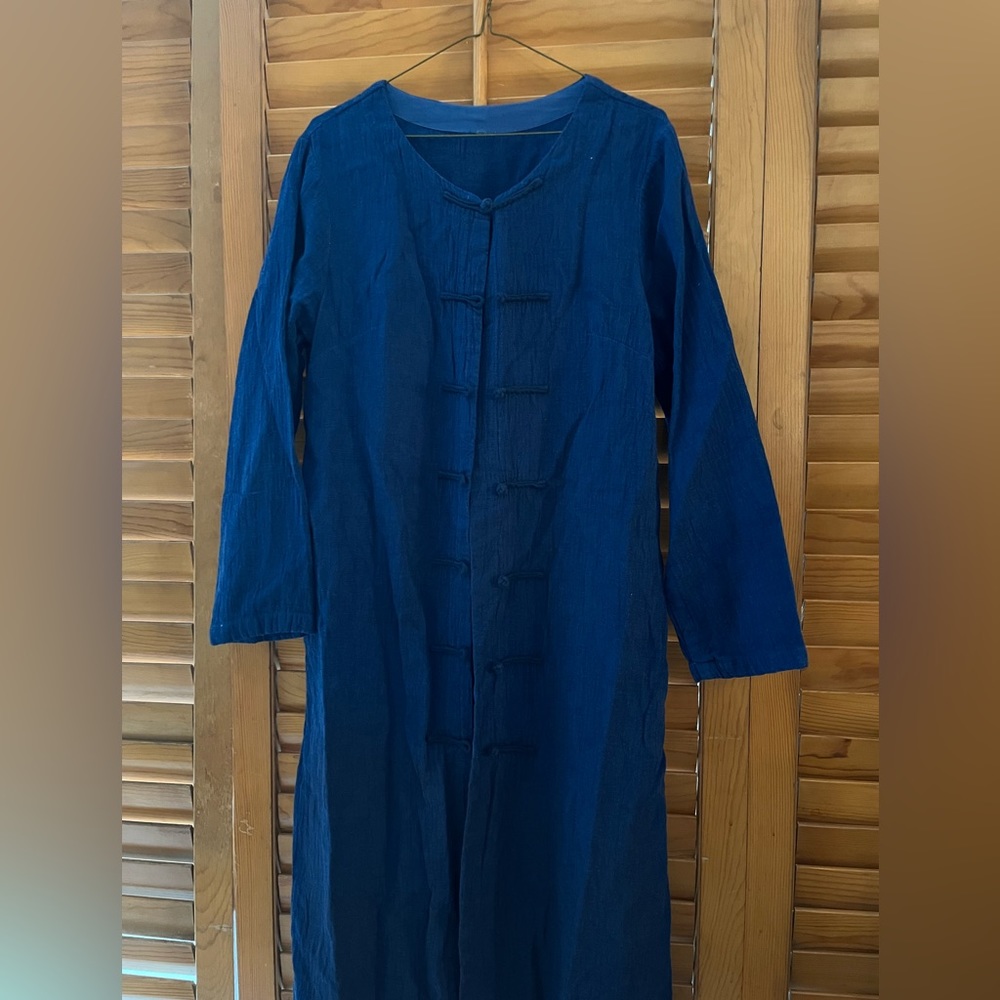 Long blue cotton coat with detailed buttons